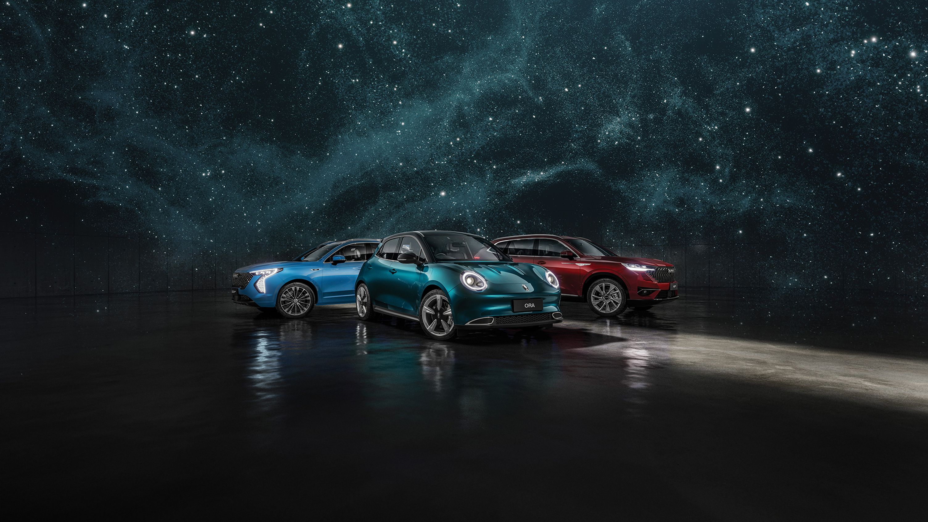 Aurora Green GWM Ora, Burgundy Red GWM Haval H6 Hybrid, and Azure Blue GWM Haval Jolion Hybrid parked together under a galaxy, starry sky