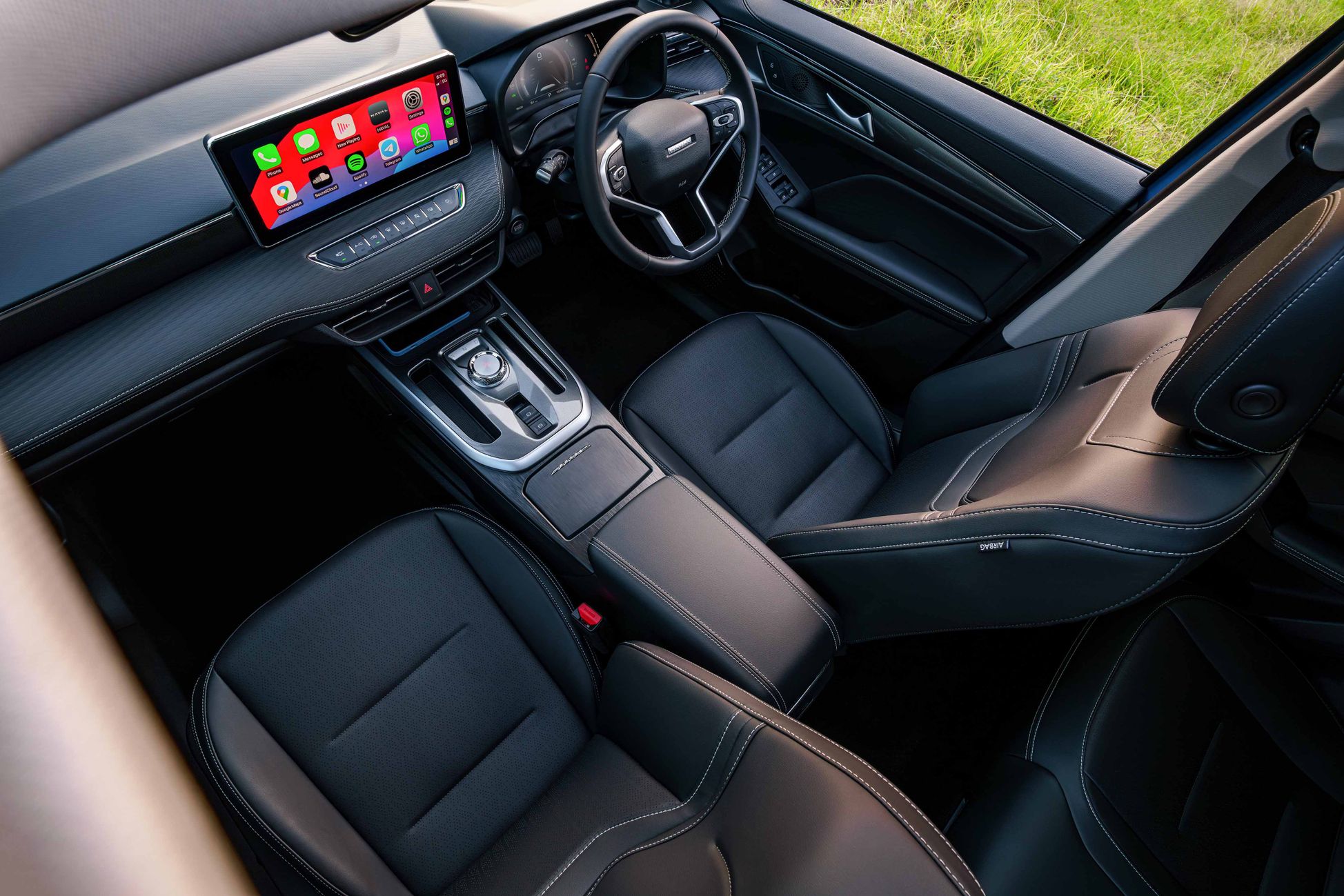 Front cabin space from the top persepctive through the sunroof in GWM's compact SUV - Aurora Green GWM Haval Jolion Hybrid