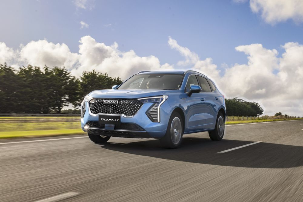 Azure Blue GWM Haval Jolion Hybrid driving through the country side